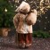 Santa Claus "in a fur cap, gifts and sleds" 47 cm, brown