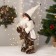 Santa Claus "in a white fur coat, in a cap, with a flashlight" moves, 40 cm