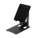 A tablet stand, adjustable, folding, rubber inserts, black