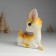 Souvenir Polystone "Deer lying with sprinkling" 16.5x7x16 cm