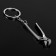 Cartage keychain, "tongs"