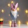 Interior doll "Santa Claus in a pink-blue outfit, in a cap with ears" 48x10x13 cm