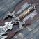 Souvenir sword on a tablet, carved blade, gold hilt with the head of a dragon