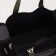 Road bag on a zipper, with an increase, 3 outer pockets, a long belt, black color/hack