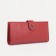 Women's wallet on the button, red color