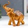 Polystone souvenir "African elephant with a flower on a blanket" under bronze 17x8.5x17 cm