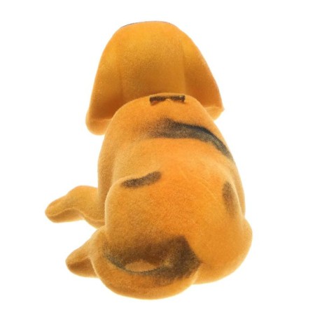 Dog on a car panel shocking his head, small, beige color-2