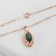 Set 3 objects: earrings, pendant, ring of an immense “Edel” oval elongated, green color in gold, 45 cm