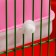 A toilet for rodents with a curly entrance, 10.4 x 8.3 x 8.6 cm, pink