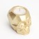 Candle "Skull" in a candlestick of gypsum with faces, 6x9x6.5cm, gold