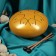 Musical instrument glucophone, yellow, 8 petals, 15 x 9 cm