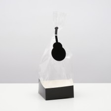 A package with a hard bottom, black, 10 x 10 x 32 cm