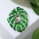 Brooch "Monster sheet" with a snail, the color is green and white in silver