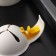 Divator for eggs with a valve fixer, 11 × 7.5 × 3.5 cm, white color