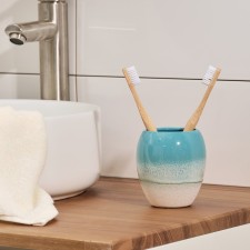 A glass for dental brushes, 9.5x9.5x10 cm, blue color