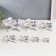 Souvenir Ceramics "Elephants with blue painting" Set 7 pcs H = 11 cm 31.5x23.5 cm