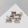 Brooch "Kit" with a catch, the color is black-green in silver