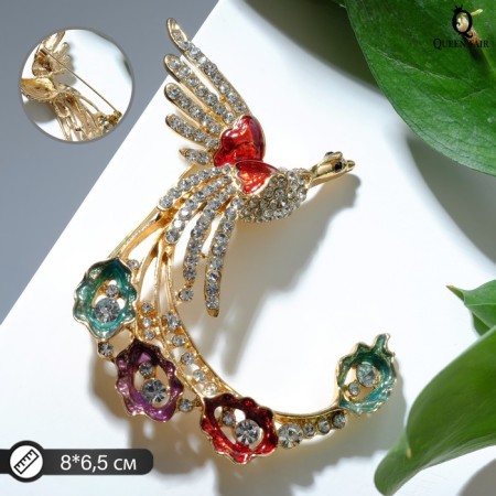 Brooch "Firebird with a magic tail", colored in gold