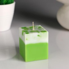 A candle-cube with a mosaic 