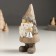 Polystone souvenir "Santa Claus in a gray-beige outfit, with a bell" 5.5x6.5x13 cm