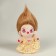 Doll "idol", blond hair, in a yellow dress