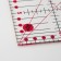 A quilting and patchwork ruler, 45 × 15 cm, thickness 3 mm, transparent/pink color