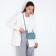 Bag Cross-Bodi with a zipper, blue color