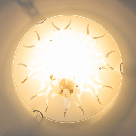 The lamp is wall-flowing "flame" 1x60W E27 d.25cm.-1