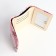 Women's wallet on the button, pink color
