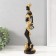 Polystone souvenir "African in gold with a jug in the hand" 7x7x29 cm
