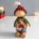 Polystone souvenir "Baby in a red hat and a green scarf with a gift" 7.5x10x17 cm