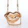 Female bag on a magnet, gold color