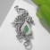 Brooch "Peacock" elegant, color in black silver