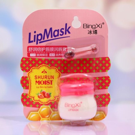 Moisturizing lip balm with strawberries