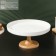 Ceramic dessert stand with a lid-pneaking on a wooden leg Bellatenero, D = 25 cm, white color