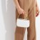 Bag Cross-Bodi with a zipper, white color