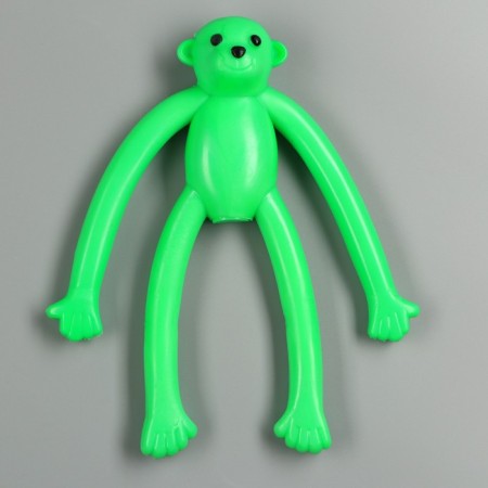 A toy for dogs "Monkey" with a squeak, 19.5 cm, silicone, green-1