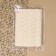 Knitted lace, 28 mm × 10 ± 1 m, beige color