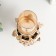Summary Metal for 1 candle "Flower. Openwork stand" gold, black 22x9.5x9.5 cm