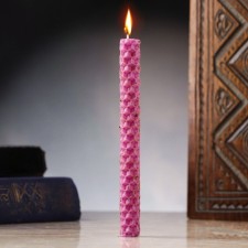 A candle from wax with cloves 