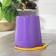 A bucket with a measured scale, 10 l, color mix