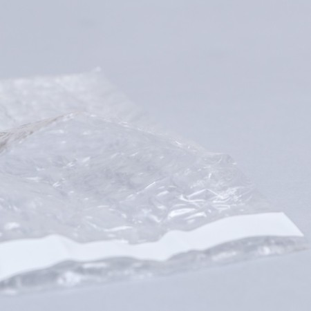 A package from a runway with a valve and an adhesive layer, p/e, 8 x 12 + 5 cm-2