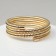 Bracelet-spring "relief" 3 rows, color gold, d = 6.5 cm
