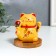 Ceramics pendulum "Maneki-Neko with fan and sakura" from solar batteries 10x10x12 cm