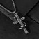 Pendant "Cross" with a snake, color black silver, l = 70 cm