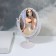 The mirror of the desktop "oval", bilateral, with an increase, the mirror surface is 11 × 15.5 cm, the color is white