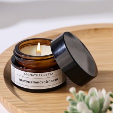Aromatic candle in the jar 