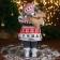 Santa Claus "In a white-red fur coat with a strap, with skis" 45 cm