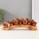 Polystone souvenir "Seven elephants on a tusk" under a tree 4.6x29x10 cm