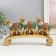Polystone souvenir "Three elephants on the arc - Popon with red -green" 24x5x15 cm